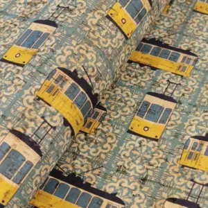 This is a electric train printed pattern on cork fabric