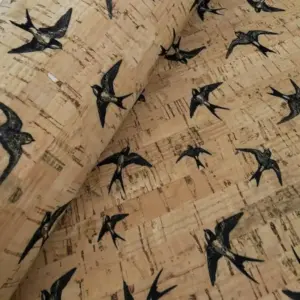 This is a swallows printed pattern on cork fabric