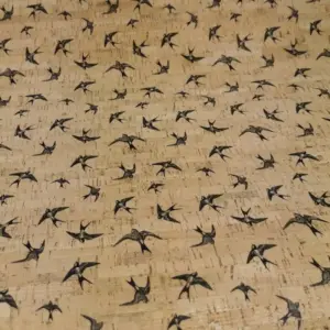 This is a swallows printed pattern on cork fabric