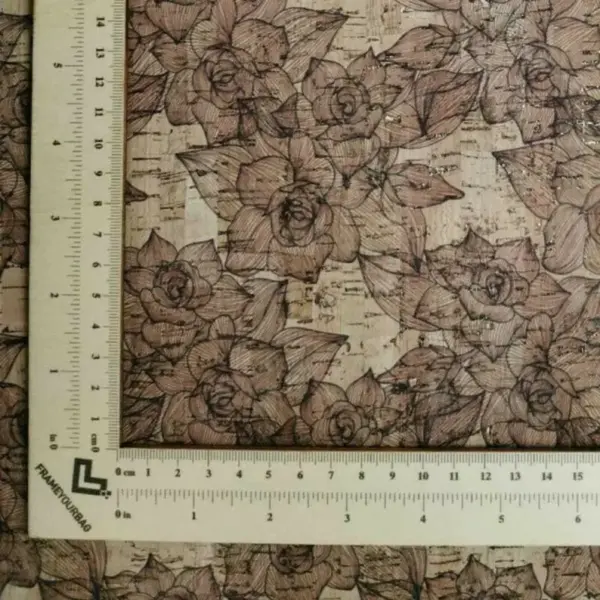This is a brown roses printed pattern on cork fabric