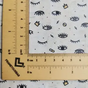 This is a eye printed pattern on cork fabric