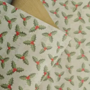 This is a holly printed pattern on cork fabric