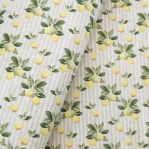 This is a lemons printed pattern on cork fabric