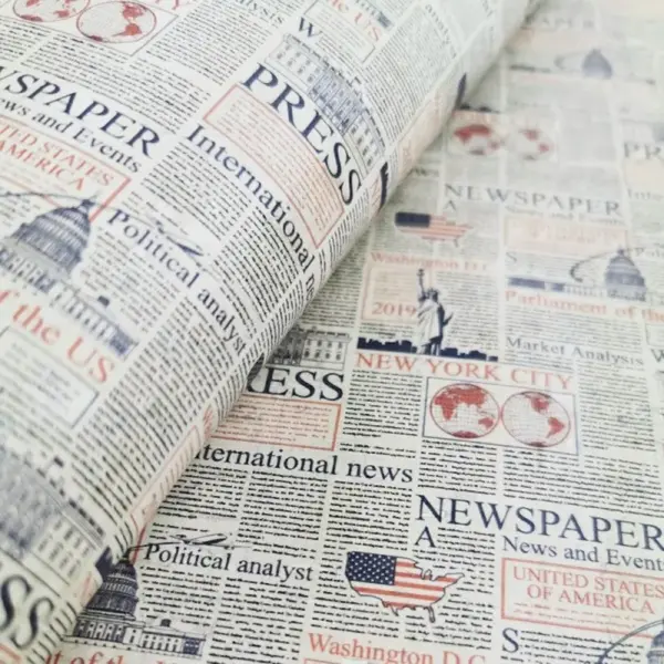 This is a newspaper printed pattern on cork fabric