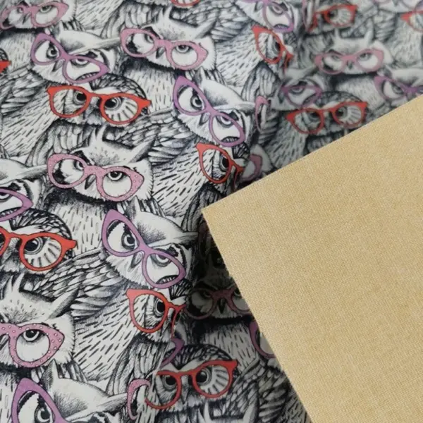 This is a owl printed pattern on cork fabric