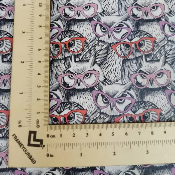 This is a owl printed pattern on cork fabric