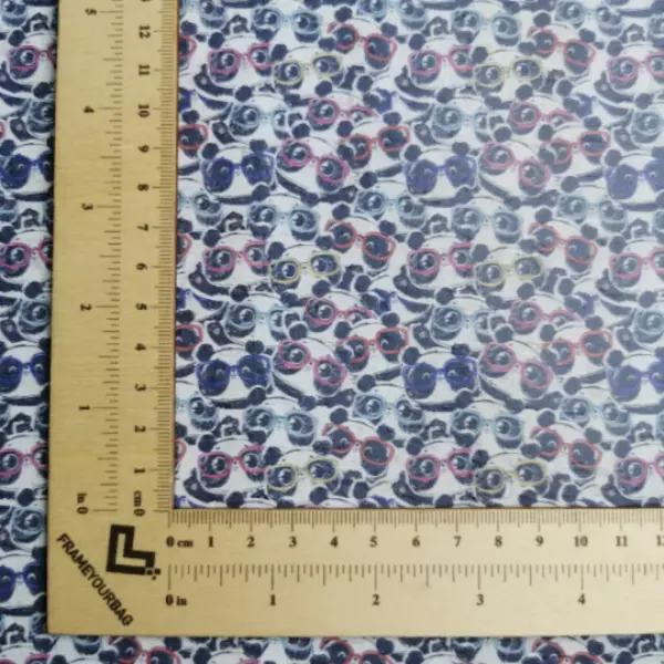 This is a panda printed pattern on cork fabric