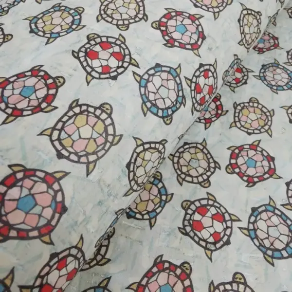 This is a turtles printed pattern on cork fabric
