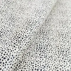 This is a dalmatian printed pattern on cork fabric