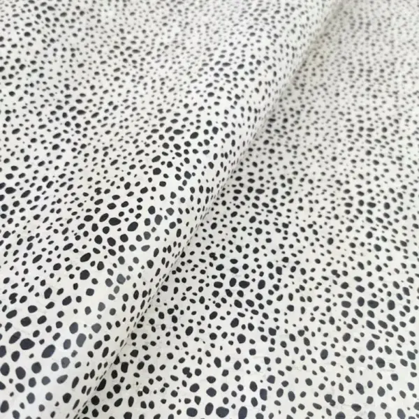 This is a dalmatian printed pattern on cork fabric