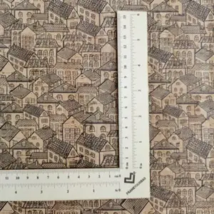 This is a houses printed pattern on cork fabric