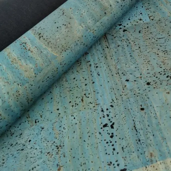 This is a petroleum blue cork fabric