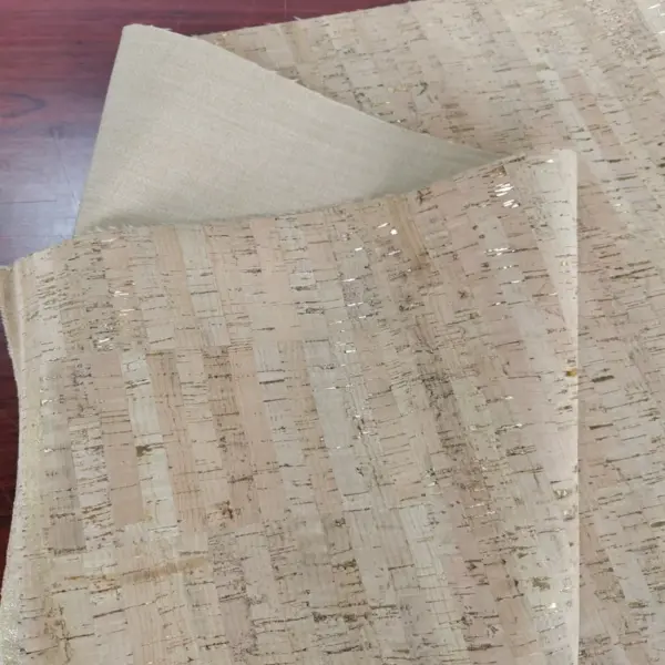 This is a natural rustic cork fabric with golden flecks