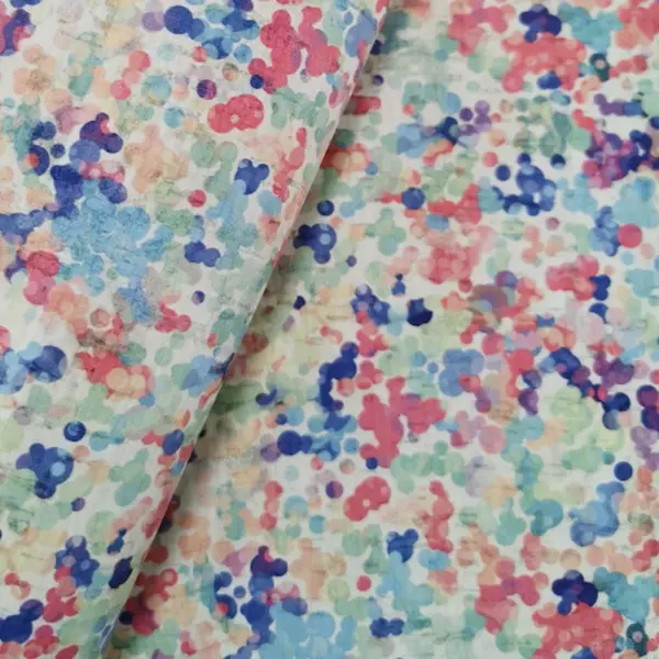 This is a colorful dots printed pattern on cork fabric