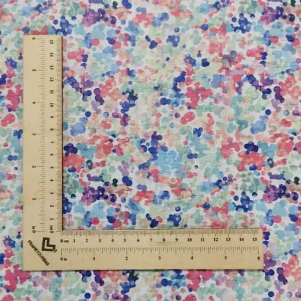 This is a colorful dots printed pattern on cork fabric