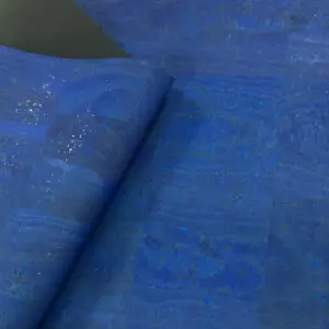 This is a royal blue superior cork fabric