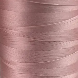 This is a light pink polyester sewing thread