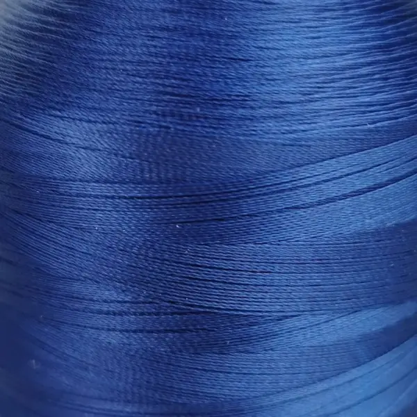 This is a royal blue polyester sewing thread
