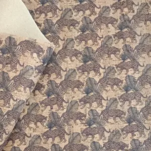 This is a leopard printed pattern on natural rustic cork fabric