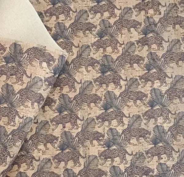 This is a leopard printed pattern on natural rustic cork fabric